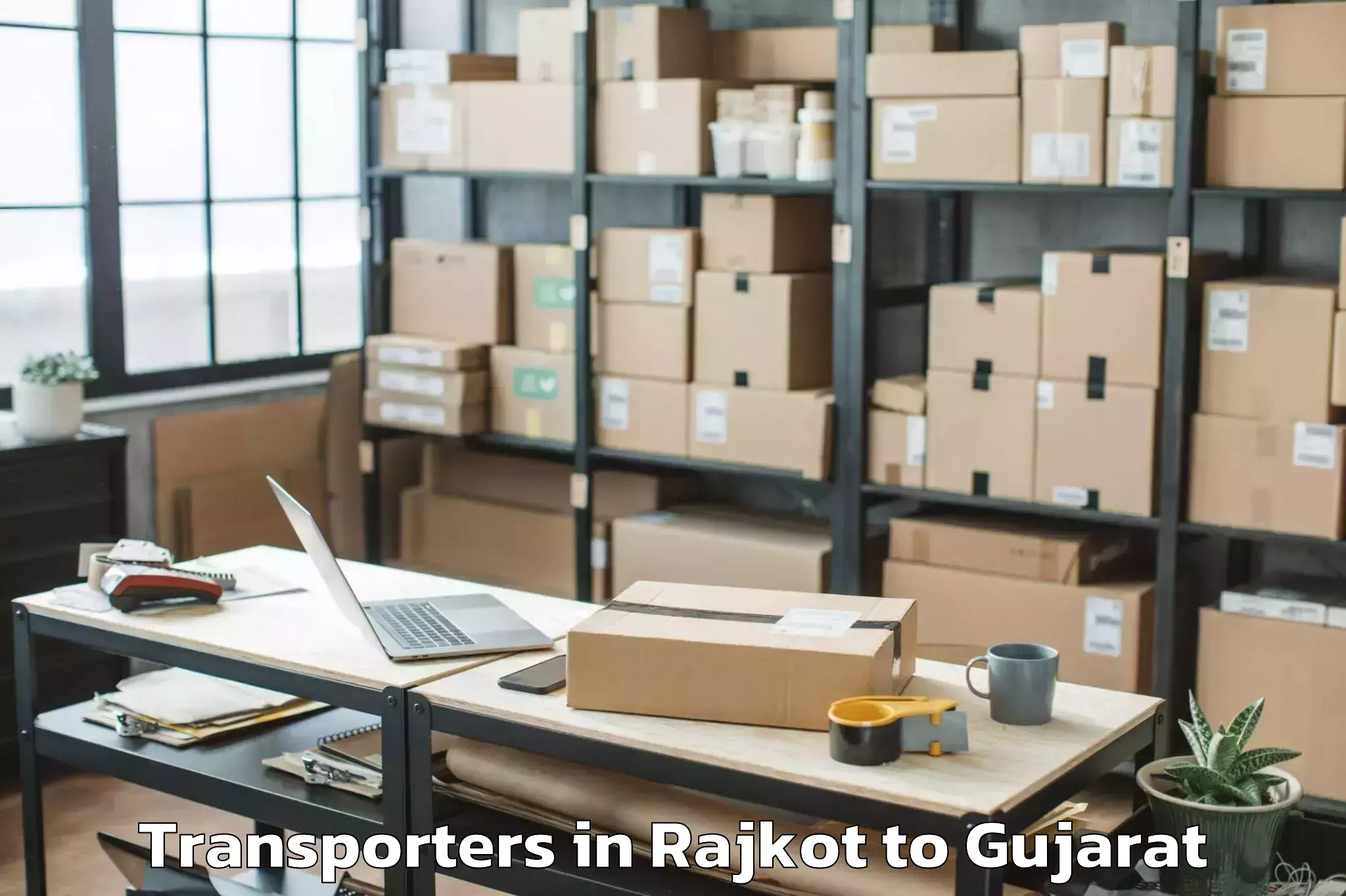 Top Rajkot to Koba Transporters Available